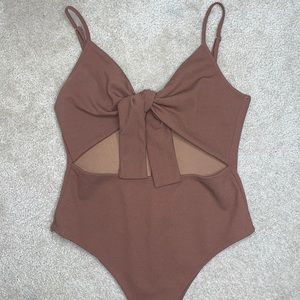 Brown tie up body suit